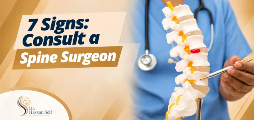 Spine surgeon in Abu Dhabi explaining signs that may require specialist spine assessment
