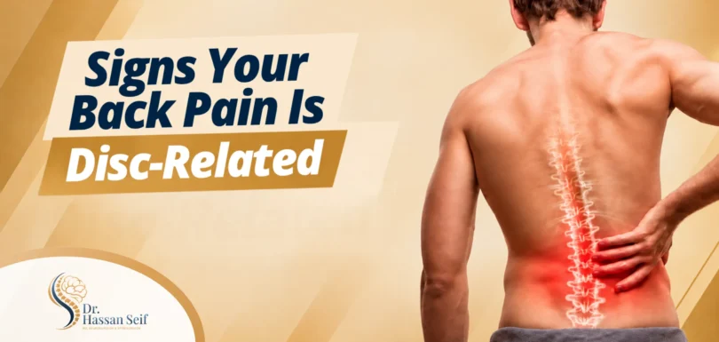 Signs that back pain may be related to a herniated disc, including pain along the spine